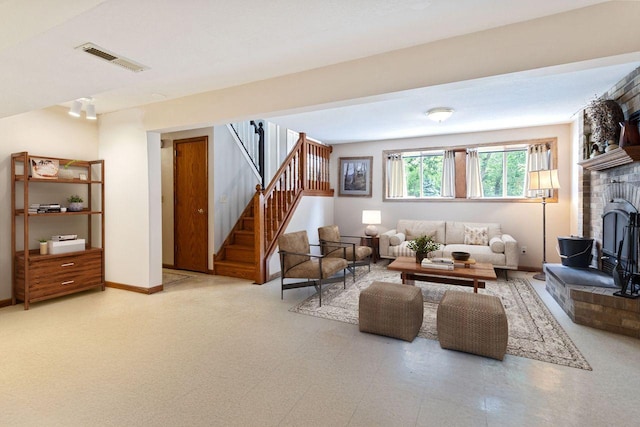 23481 Fontana St NE, Linwood Twp, MN 55079 - living room with stairway and a fireplace