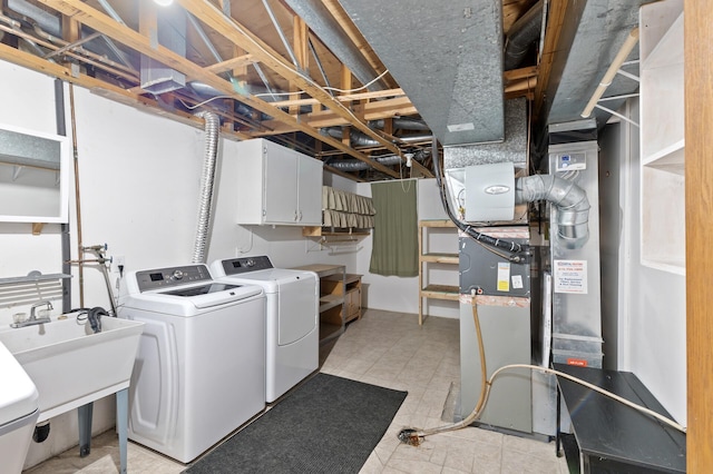 4982 148th Path W, Apple Valley, MN 55124 - laundry room featuring separate washer and dryer and light tile patterned flooring