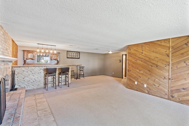 4982 148th Path W, Apple Valley, MN 55124 - living area with a textured ceiling and a fireplace