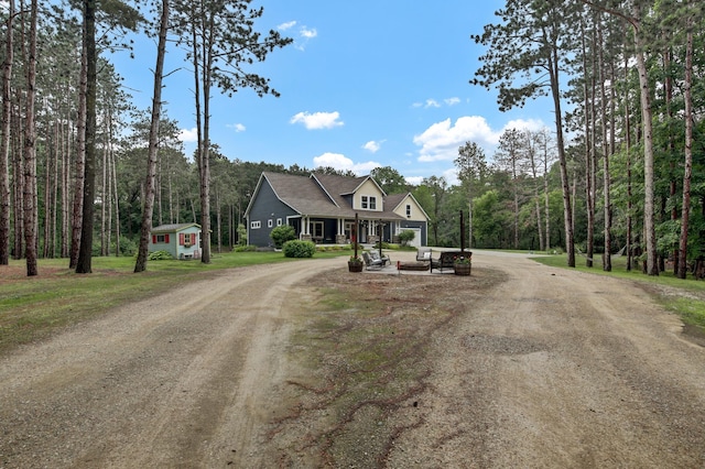 35853 Whispering Pine Way, Florence Twp, MN 55041 - view of dirt / gravel driveway featuring a wooded view