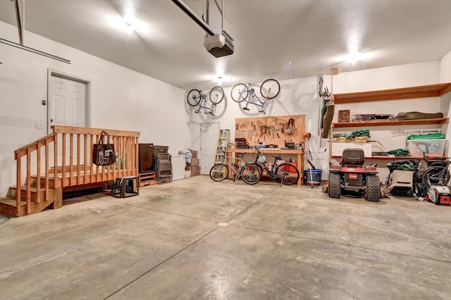 35853 Whispering Pine Way, Florence Twp, MN 55041 - garage featuring a garage door opener and a workshop area