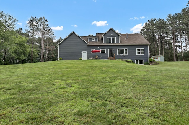 35853 Whispering Pine Way, Florence Twp, MN 55041 - rear view of house with a lawn and a storage shed