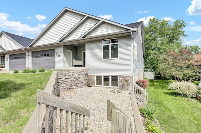 308 Iowa St, Lake City, MN 55041 - view of front of property featuring an attached garage, a front yard, and driveway