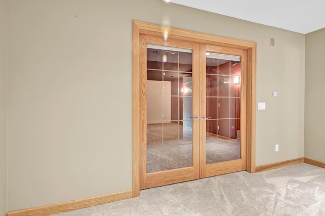 308 Iowa St, Lake City, MN 55041 - spare room with french doors and carpet floors
