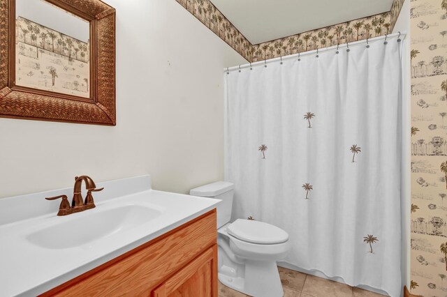 308 Iowa St, Lake City, MN 55041 - bathroom featuring vanity, tile patterned floors, and a shower with shower curtain