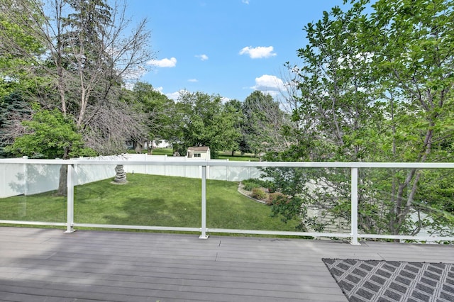 308 Iowa St, Lake City, MN 55041 - wooden deck with a fenced backyard and view of scattered trees