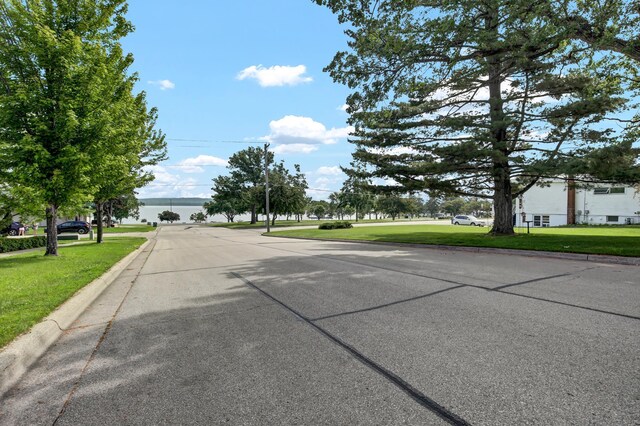 308 Iowa St, Lake City, MN 55041 - view of asphalt road featuring curbs