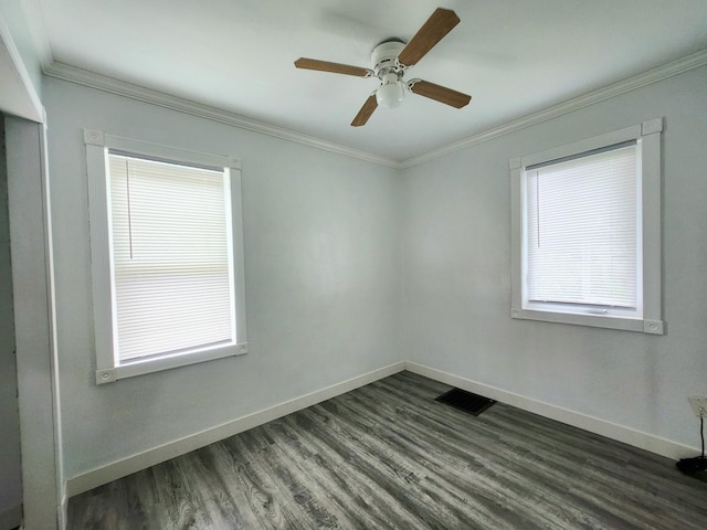 1222 8th Ave SE, Rochester, MN 55904 - unfurnished room with dark wood finished floors, ornamental molding, and ceiling fan