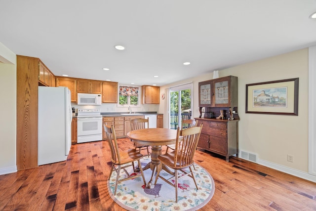 830 Willis St, Dassel, MN 55325 - dining room with recessed lighting and light wood-style flooring