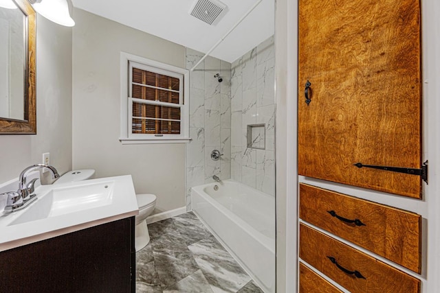 710 Jefferson St, New Ulm, MN 56073 - bathroom with vanity, marble finish floors, and shower / bath combination
