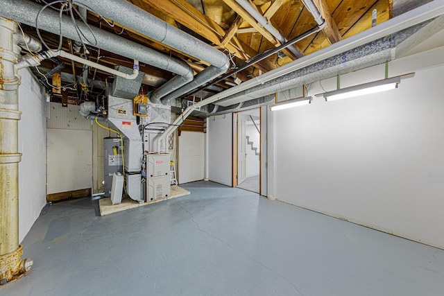 710 Jefferson St, New Ulm, MN 56073 - unfinished basement featuring water heater and heating unit
