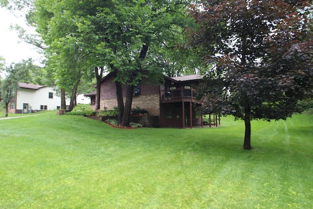 13445 190th Ave NW, Elk River, MN 55330 - view of grassy yard with a wooden deck