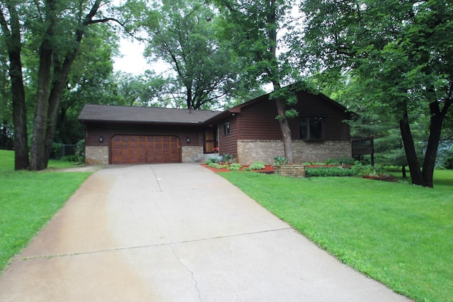 13445 190th Ave NW, Elk River, MN 55330 - view of front facade featuring driveway, a garage, a front yard, and stone siding