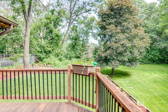 13445 190th Ave NW, Elk River, MN 55330 - wooden terrace with a lawn and a storage unit