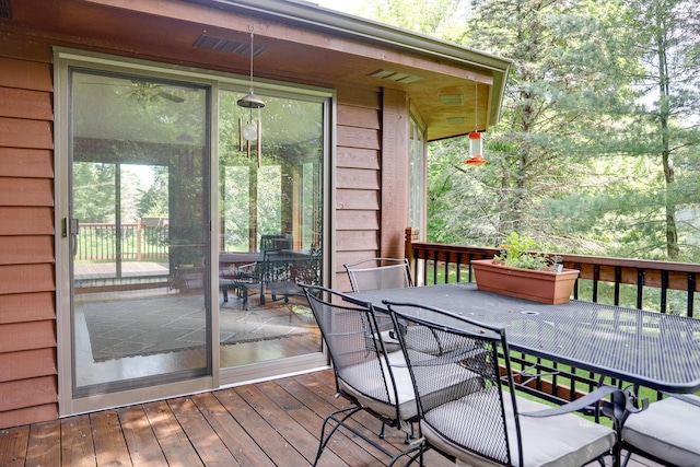 13445 190th Ave NW, Elk River, MN 55330 - wooden terrace with outdoor dining area