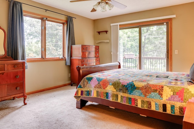 13445 190th Ave NW, Elk River, MN 55330 - carpeted bedroom featuring access to exterior and a ceiling fan