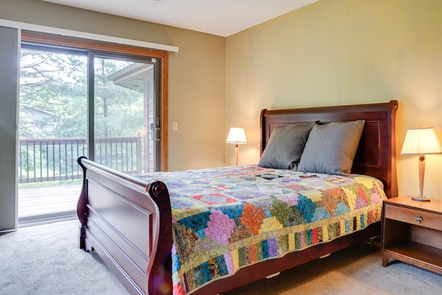 13445 190th Ave NW, Elk River, MN 55330 - bedroom featuring carpet floors and access to exterior