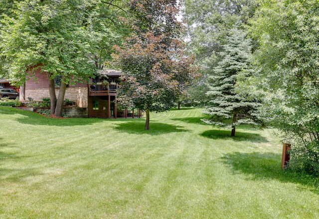13445 190th Ave NW, Elk River, MN 55330 - view of green lawn featuring a deck