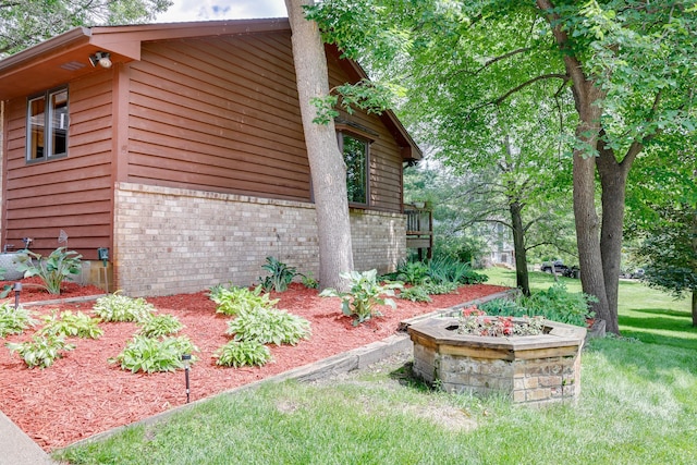 13445 190th Ave NW, Elk River, MN 55330 - view of home's exterior with brick siding
