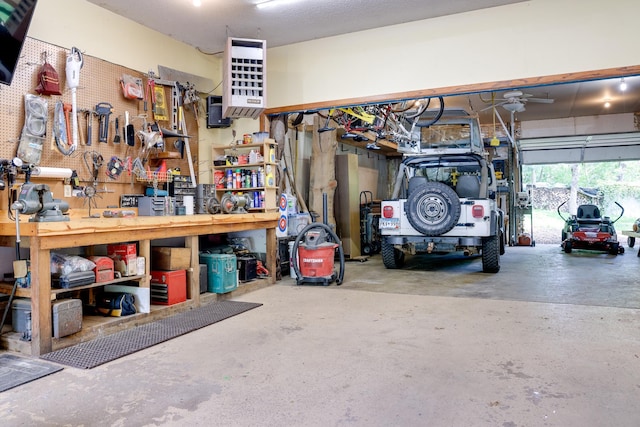 13445 190th Ave NW, Elk River, MN 55330 - garage with a workshop area and a heating unit
