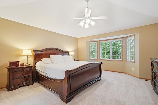 8017 Lismore Cir, Eden Prairie, MN 55347 - bedroom featuring light carpet, ceiling fan, and vaulted ceiling