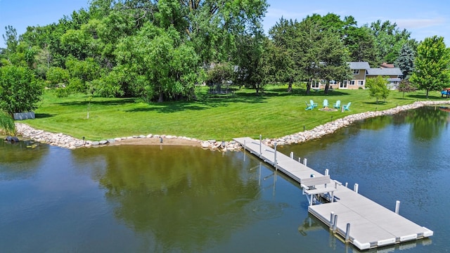 12329 Timber Ln, Maple Grove, MN 55369 - dock area featuring a water view, a lawn, and view of scattered trees