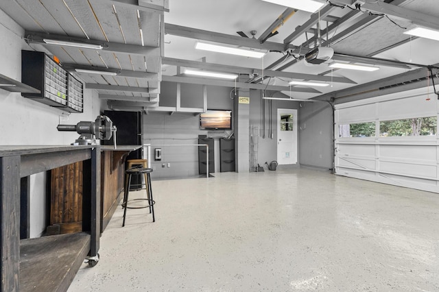 12329 Timber Ln, Maple Grove, MN 55369 - garage featuring a garage door opener