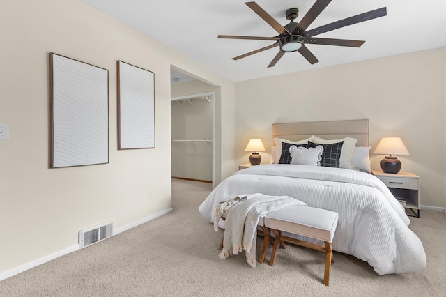 12329 Timber Ln, Maple Grove, MN 55369 - carpeted bedroom featuring a spacious closet and ceiling fan