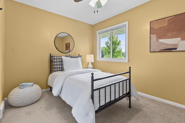 12329 Timber Ln, Maple Grove, MN 55369 - carpeted bedroom with baseboards and ceiling fan