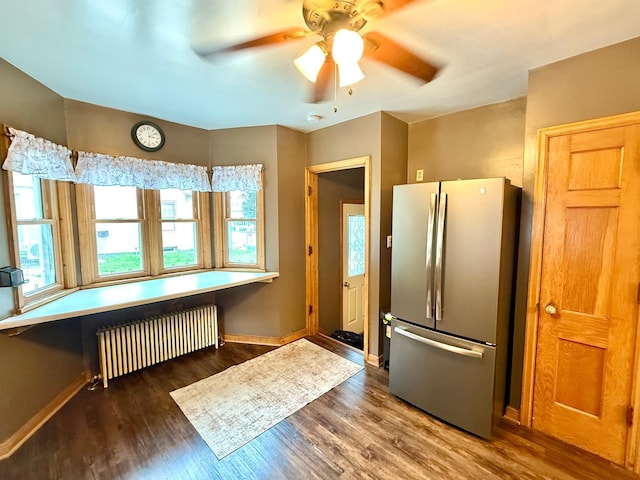 215 1st St N, Cannon Falls, MN 55009 - kitchen with radiator, freestanding refrigerator, plenty of natural light, and a ceiling fan