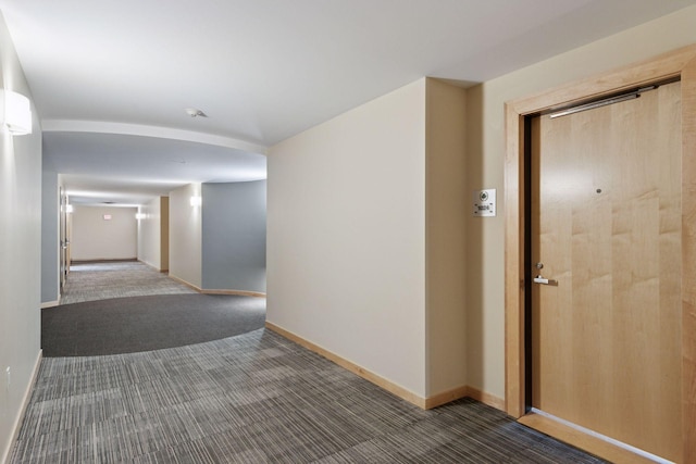 1240 2nd St Unit 1024, Minneapolis, MN 55415 - hallway featuring carpet flooring and baseboards
