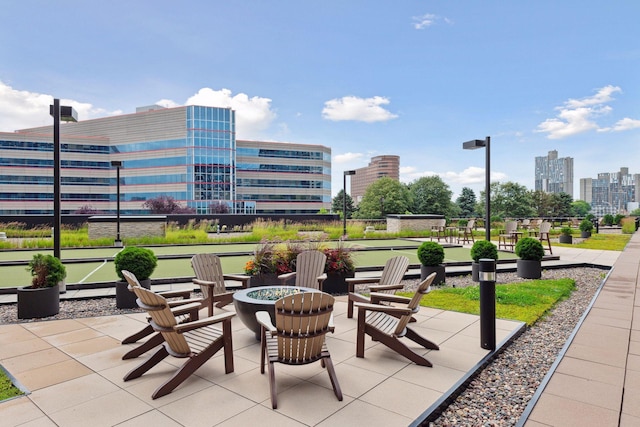 1240 2nd St Unit 1024, Minneapolis, MN 55415 - view of patio / terrace featuring a bocce ball area and a view of city