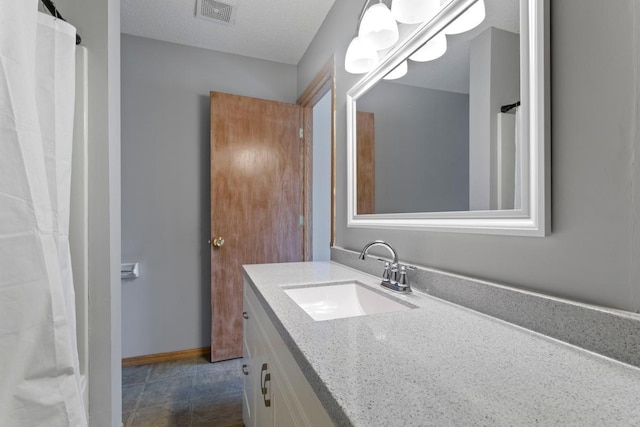10787 Unity Ln N, Brooklyn Park, MN 55443 - bathroom with vanity and baseboards