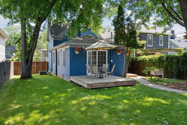 721 Smith Ave S, Saint Paul, MN 55107 - rear view of house featuring a fenced backyard and a deck