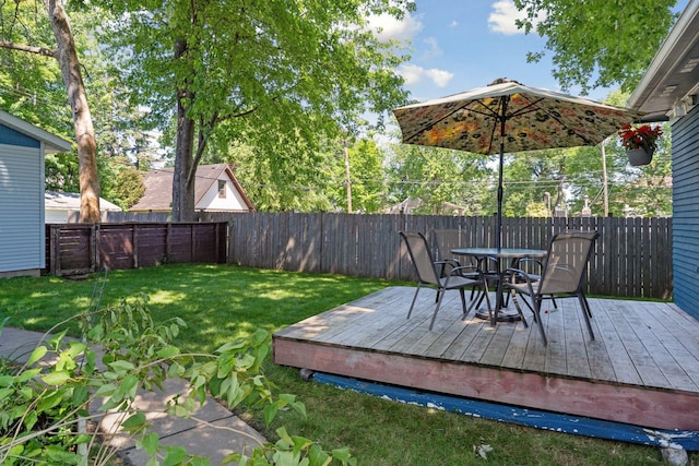 721 Smith Ave S, Saint Paul, MN 55107 - wooden terrace with a fenced backyard and outdoor dining space