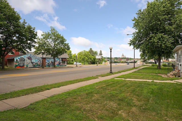 721 Smith Ave S, Saint Paul, MN 55107 - view of asphalt street featuring sidewalks, street lighting, and curbs