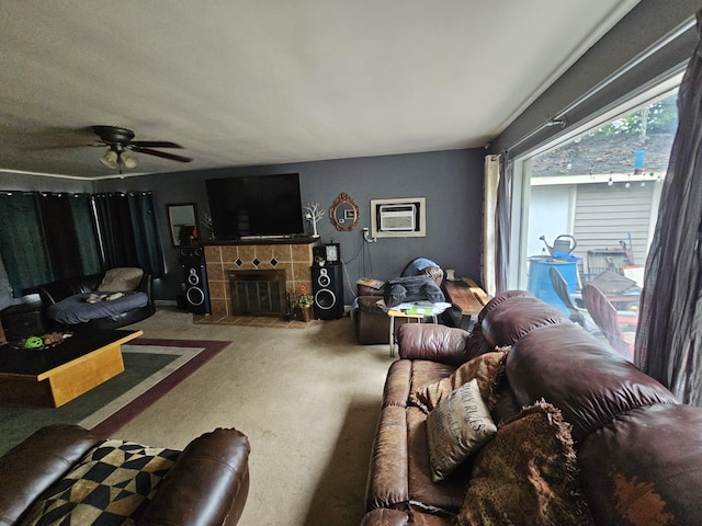 216 Hobart St, Owatonna, MN 55060 - living room with carpet floors, ceiling fan, a wall mounted air conditioner, and a tiled fireplace