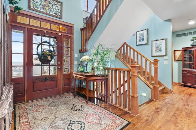 12322 Coffee Trl, Rosemount, MN 55068 - entrance foyer with wood finished floors, stairs, and recessed lighting
