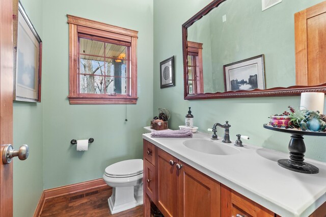 12322 Coffee Trl, Rosemount, MN 55068 - bathroom with vanity and wood finished floors