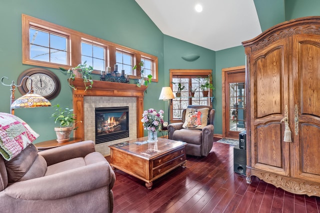 12322 Coffee Trl, Rosemount, MN 55068 - living area with dark wood-style floors, high vaulted ceiling, and a tile fireplace
