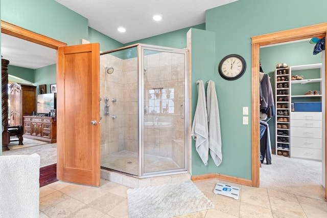 12322 Coffee Trl, Rosemount, MN 55068 - bathroom featuring a shower stall and a walk in closet