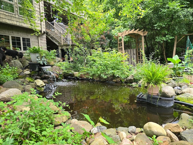 12322 Coffee Trl, Rosemount, MN 55068 - view of yard featuring a garden pond and stairs