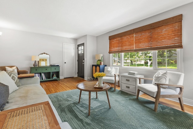 4633 Ewing Ave N, Robbinsdale, MN 55422 - living room featuring healthy amount of natural light and wood finished floors