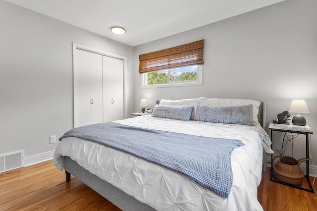 4633 Ewing Ave N, Robbinsdale, MN 55422 - bedroom featuring wood finished floors and a closet
