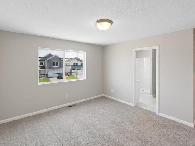 3214 Kady Ave NE, Saint Michael, MN 55376 - spare room featuring carpet and a textured ceiling