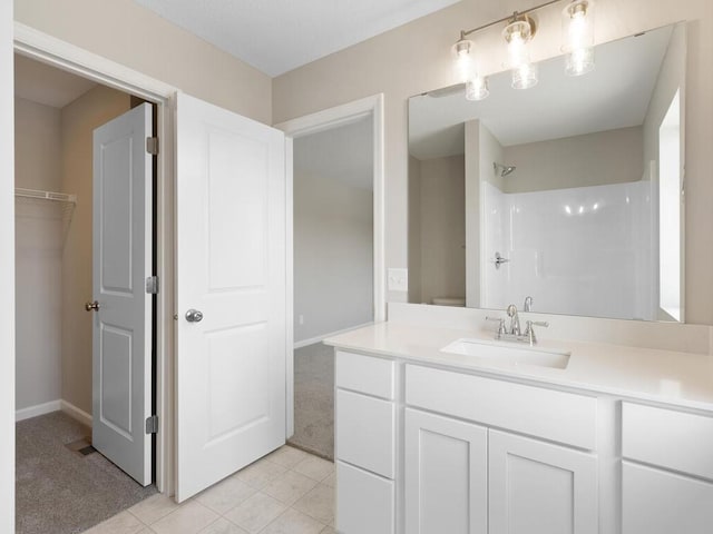 3214 Kady Ave NE, Saint Michael, MN 55376 - full bathroom with a shower, vanity, and tile patterned flooring