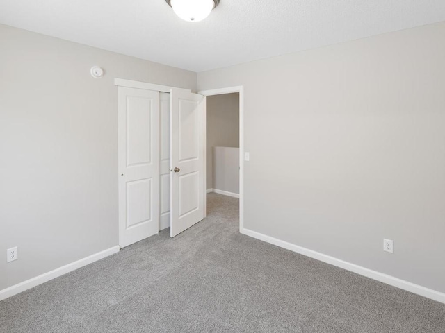 3214 Kady Ave NE, Saint Michael, MN 55376 - unfurnished bedroom featuring carpet floors and a closet