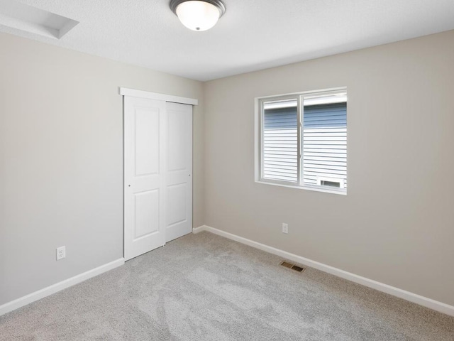 3214 Kady Ave NE, Saint Michael, MN 55376 - unfurnished bedroom with carpet and a closet