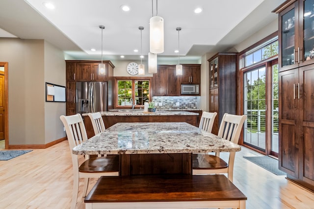 4326 Donway Dr NE, Alexandria, MN 56308 - dining room featuring light wood-type flooring and recessed lighting