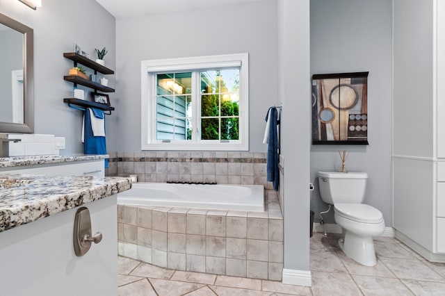 4326 Donway Dr NE, Alexandria, MN 56308 - bathroom featuring tile patterned flooring, a garden tub, and vanity